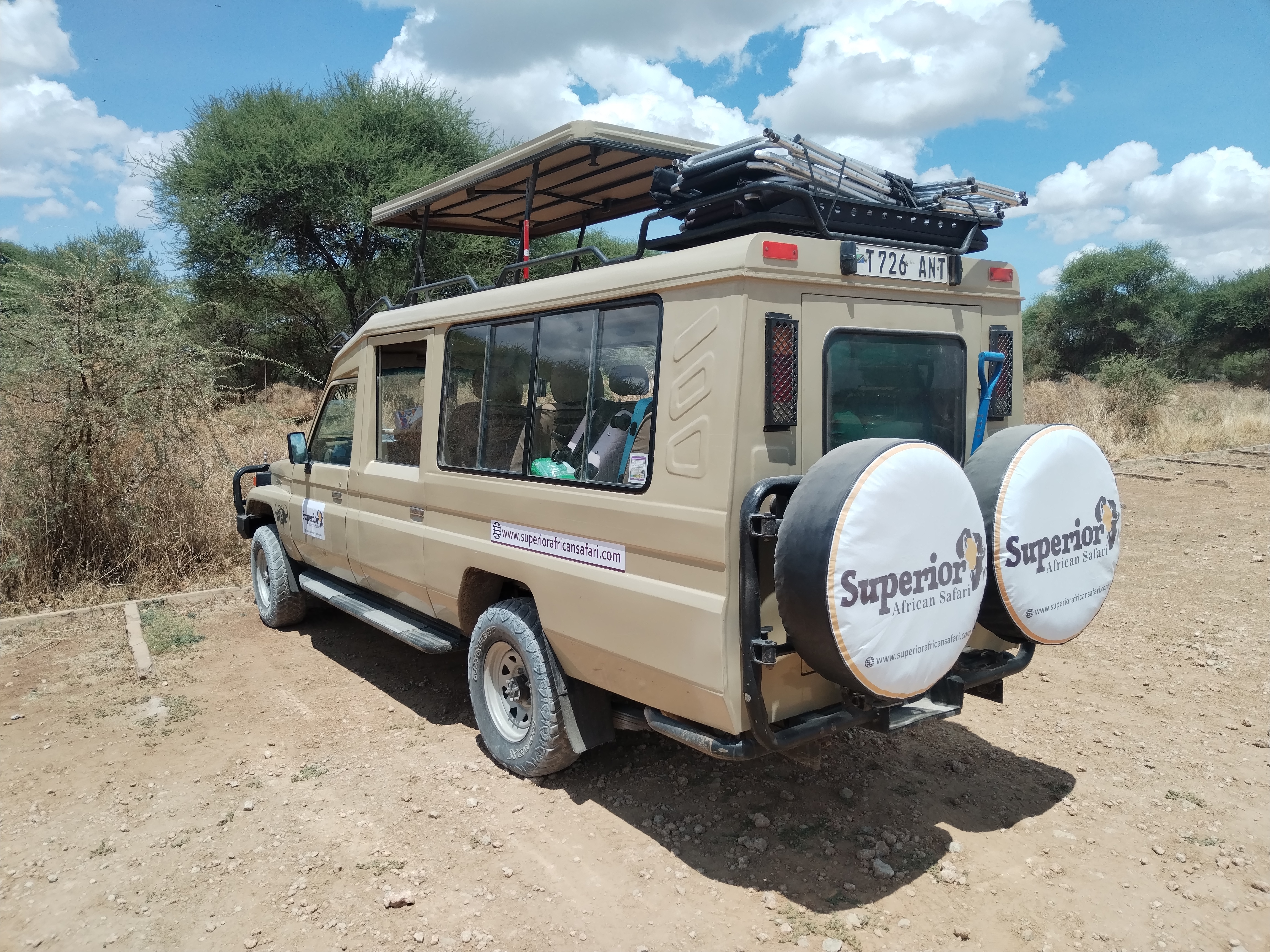 A 4x4 Land Cruiser safari vehicle.