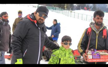 Wajid Ali with Children in Gulmarg