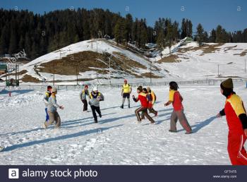 girls playing in winter at gulmarg