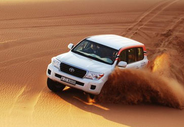 Top dune bashing tour packages for desert adventure