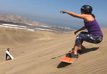 Top sandboarding tour packages for desert thrills