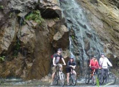 Bike to Kuang Si Waterfall & Cruise the Mekong River Back Fullday
